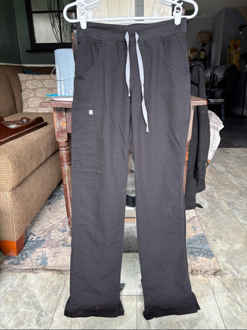 Scrubs: Women’s Black Drawstring pants, please see pics for damages